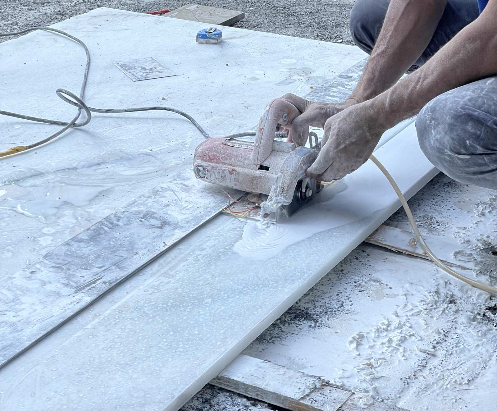 White marble slab being cut to size on site